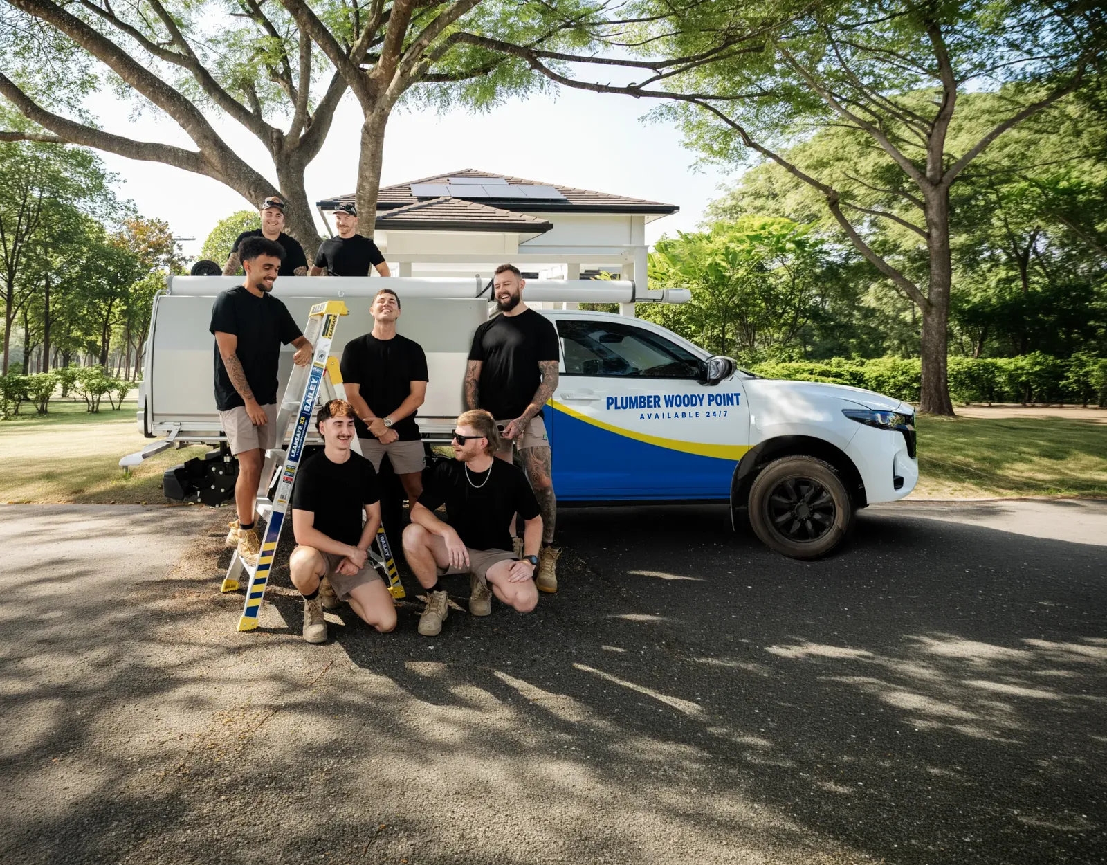 Plumber Woody Point ute and team